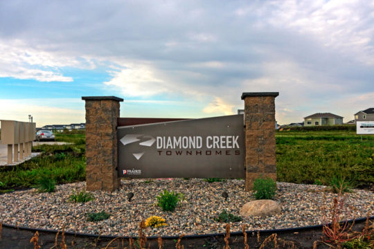 sign, diamond creek townhomes in west fargo