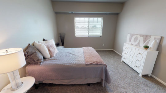 bedroom, the grand off 45th apartments in fargo