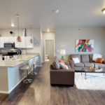 kitchen and living area, the grand off 45th apartments in fargo