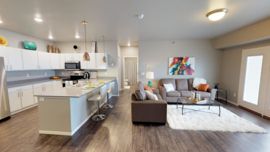 kitchen and living area, the grand off 45th apartments in fargo