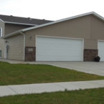 exterior of fargo twin home, brown outside